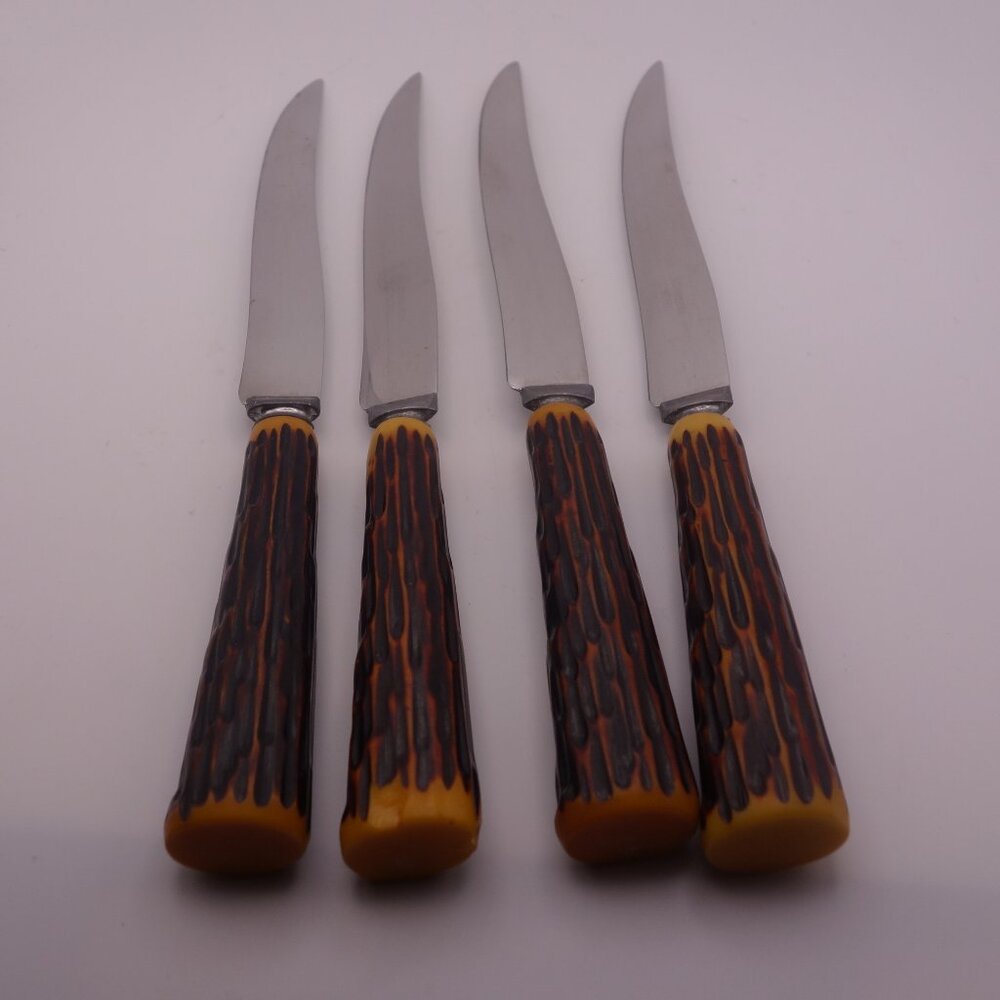 Set of Four(4) Faux Bone Stainless Steel Knives